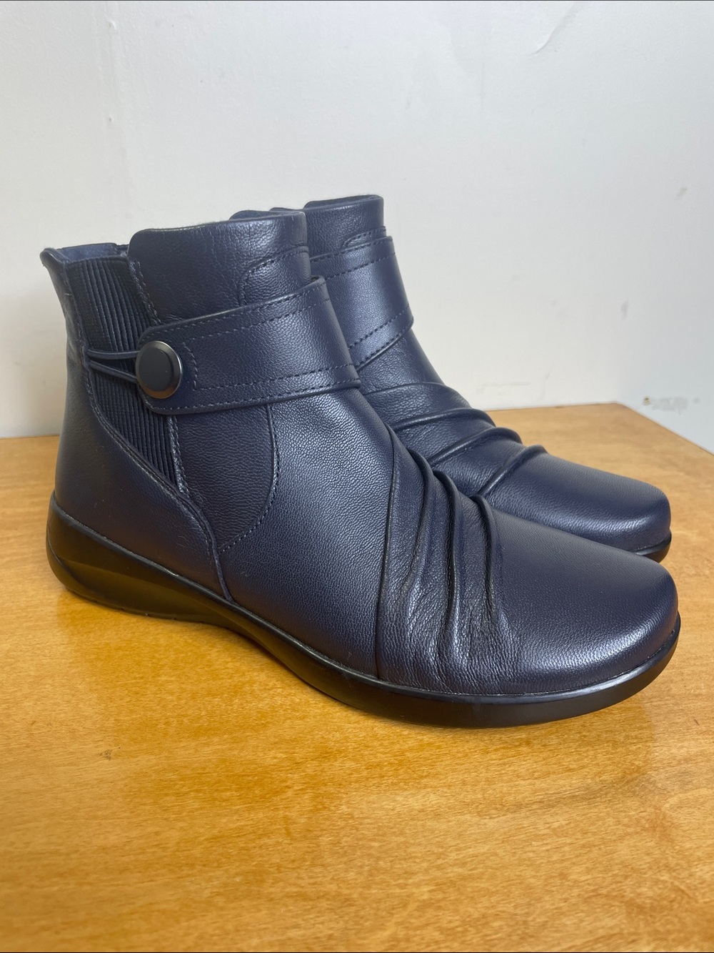 Clarks Navy Leather Ankle Booties with Button Strap Detail. Size 8